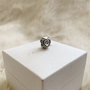 Retired pandora heart silver charm